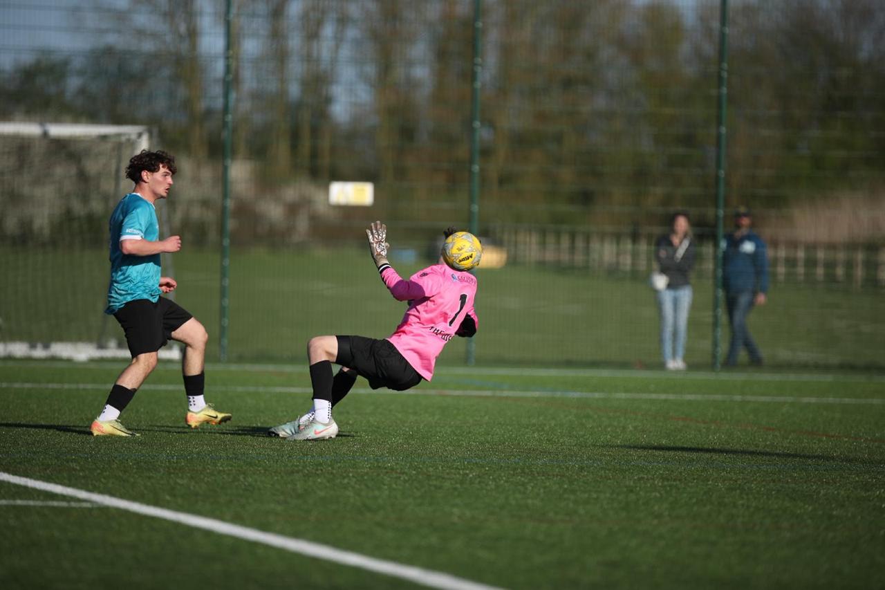 Olly Robinson rounding the goalkeeper